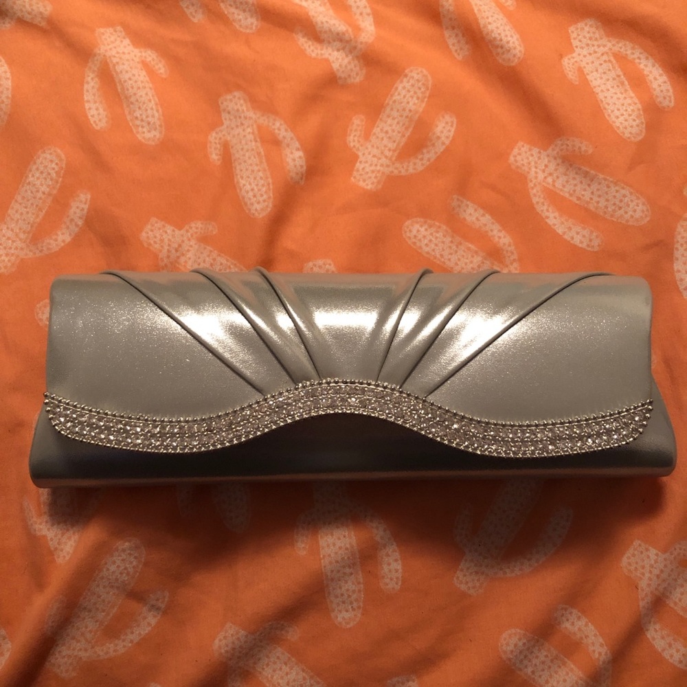 Silver clutch with gems